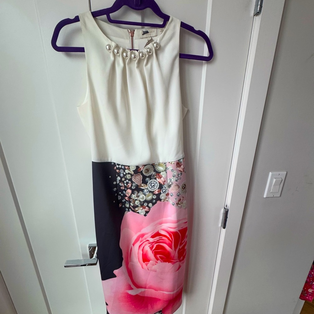 Ted Baker size 1 (S, 4-6) sleevless dress with pearl neckline and floral skirt.